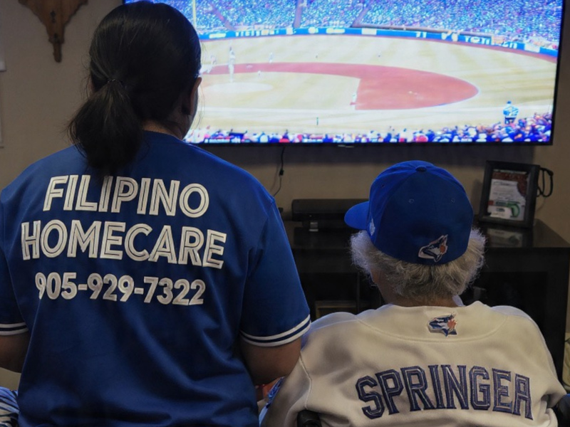 Filipino Homecare caregiver providing companionship and safety support in Ontario